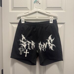 Black Graphic Shorts with White Design and Pockets